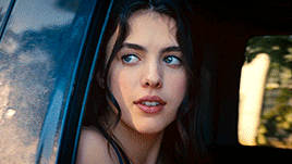 Margaret Qualley Looking Out Car Window GIF