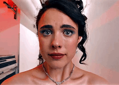 Margaret Qualley The Substance Smiling With Teary Eyes GIF
