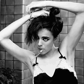 Margaret Qualley Tying Hair Black And White GIF