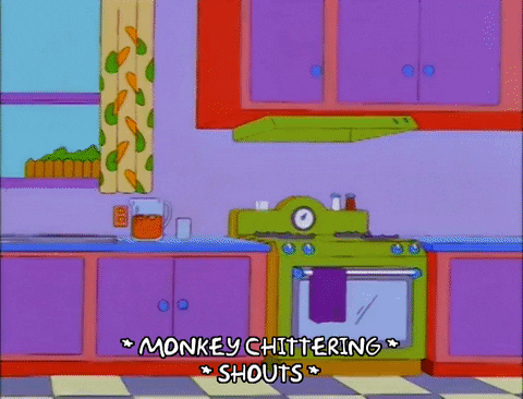 Marge Simpson Chasing Crazy Chimp In Kitchen GIF
