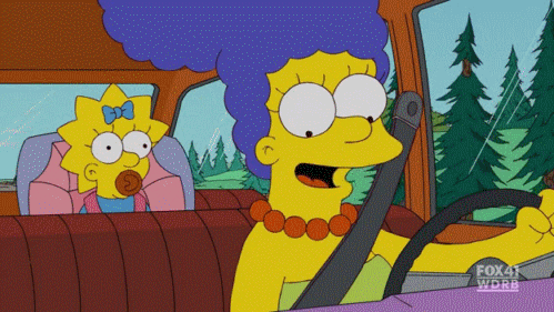 Marge Simpson Loading Cd Into Player GIF
