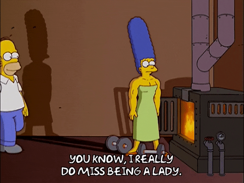 Marge Simpson Tossing Dumbbells Into Fire GIF