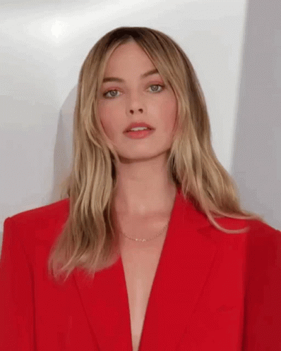 Demure Margot Robbie Red Suit GIF