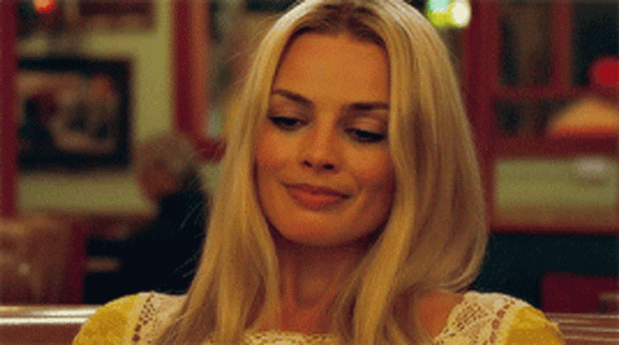 Margot Robbie Contemplating Taking Deep Breaths GIF