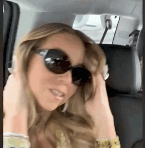 Mariah Carey Posing Inside Car GIF