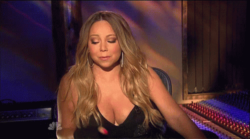 Mariah Carey Touching Hair While Listening GIF