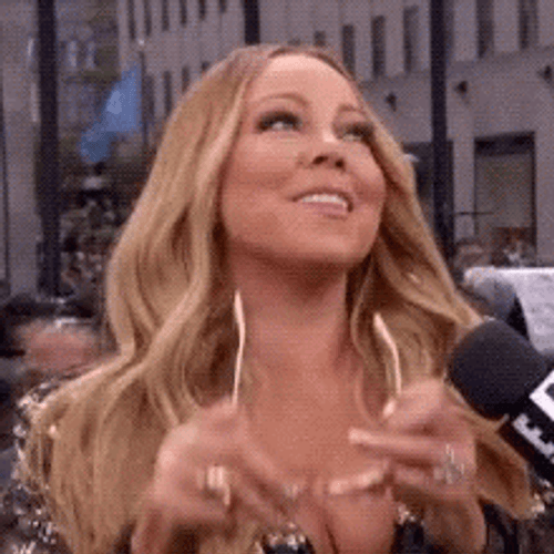 Mariah Carey Putting On Sunglasses GIF