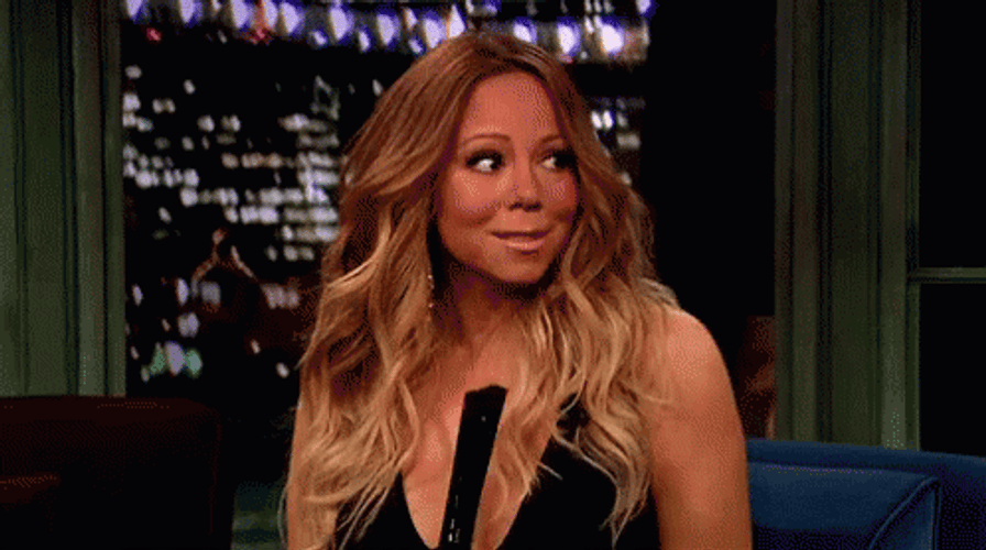 Mariah Carey Shy Shrugging GIF
