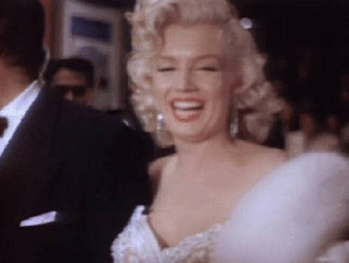 Marilyn Monroe Laughing In Front Of Camera GIF