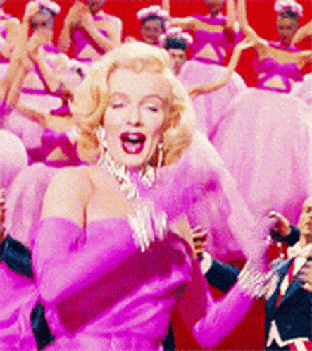 Marilyn Monroe Performing Wearing A Pink Dress GIF