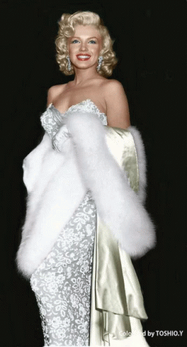 Marilyn Monroe Wearing A White Elegant Gown GIF
