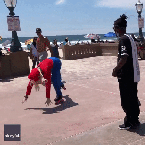 Mario Cosplayer Break Dancing GIF