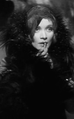 Marlene Dietrich Putting Lipstick On GIF