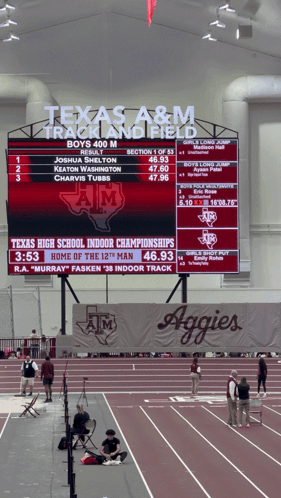 Maroon Gig 'Em Logo With Cowboy Carrying Football