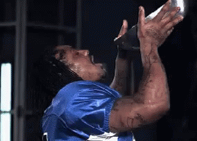 Marshawn Lynch Pouring Food On His Mouth GIF