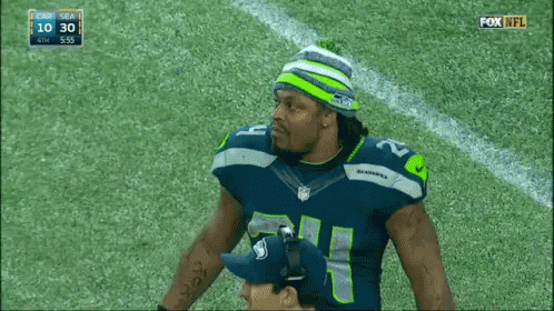Marshawn Lynch Shaking Hands GIF