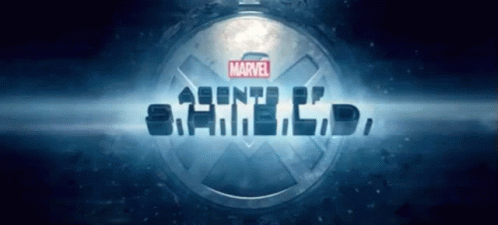 Marvel Shield Logo On Dark Blue Background GIF