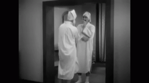 Marx Brothers Groucho Suspicious Mirror GIF
