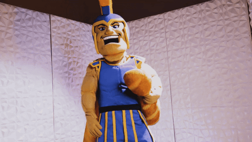 Mascot in Blue and Yellow Outfit and Helmet