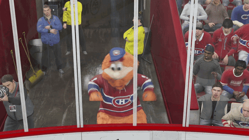 Mascot in Canadiens Jersey in Front of Crowd