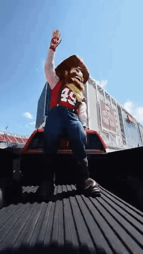 Mascot in Cowboy Costume with Number 49