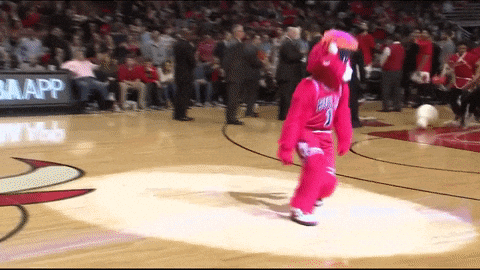 Mascot Performing Salsa In Basketball Court GIF