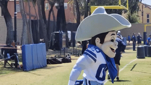 Mascot Wearing Cowboy Hat and Blue Scarf with 10
