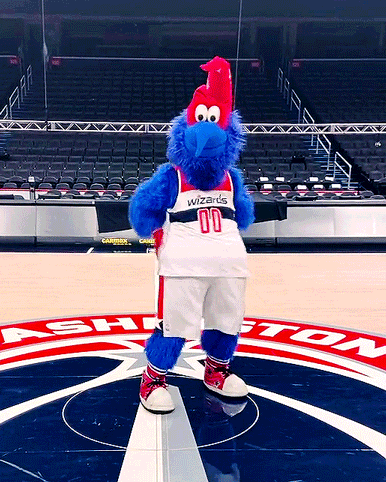 Mascot Wearing Wizards Jersey On Basketball Court GIF
