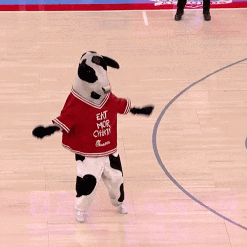 Mascots Body Slam In Basketball Court GIF