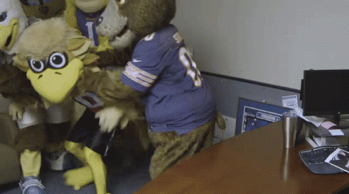 Mascots One Wearing Number 8 Jersey