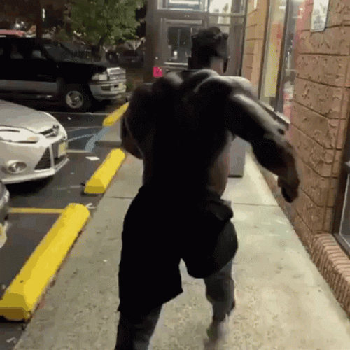 Masculine Big Black Guy Walking Meme GIF