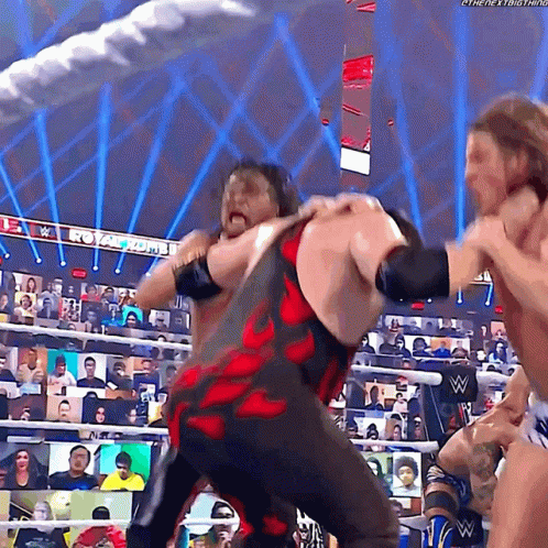 Masked Kane Chokeslam Riddle And Shinsuke Nakamura GIF