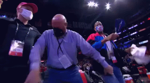 Masked Man Dancing In Stadium GIF