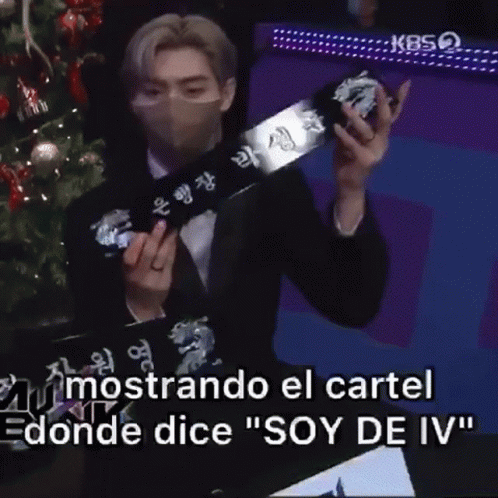 Masked Man Holding Box Christmas Tree Says Soy De Iv