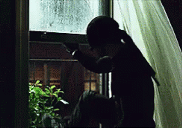 Masked Man Jump Out Window GIF