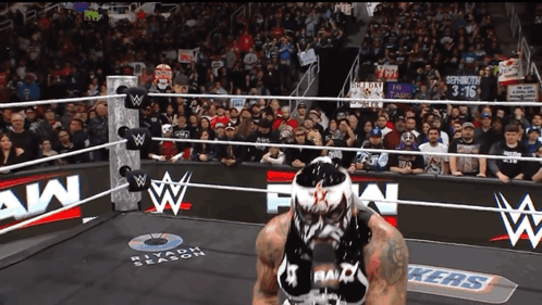 Masked Man Saying Zero in Front of Circle