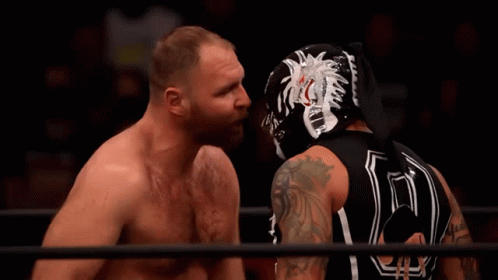 Masked Wrestler With Number 10 on Back