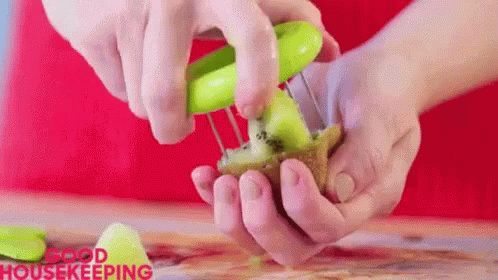 Mason Jar Pouring Fruit into Glass Country Living