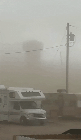 Massive Dust Storm Covering Skyscrapers GIF