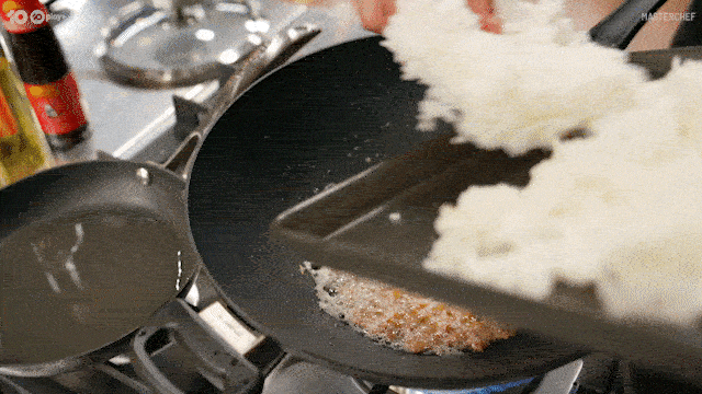 Masterchef Australia Contestant Putting Rice Into A Pan GIF