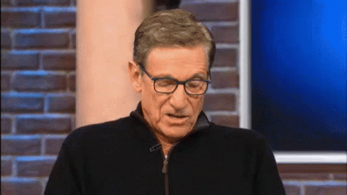 Maury Wearing Glass Sighing GIF