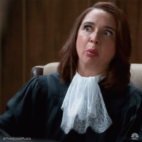 Maya Rudolph Disagreeing Face Reaction GIF