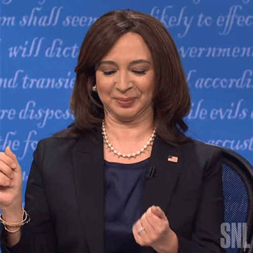 Maya Rudolph Patting Her Face GIF