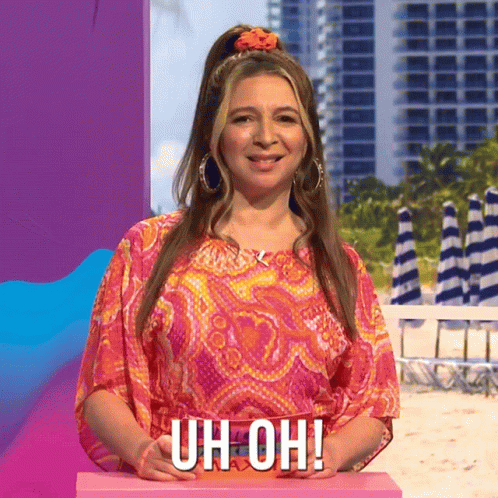 Maya Rudolph Uh Oh Reactions With Two Hands Up GIF