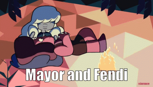 Mayor and Fendi Laying by a Fire