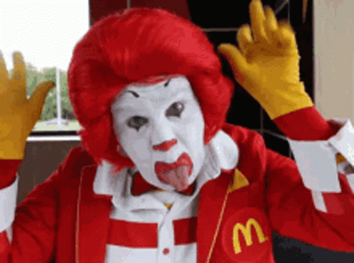McDonald's Clown Sticking Out Tongue in McDonald's Jacket
