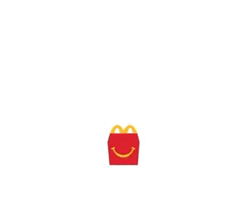 McDonald's Happy Meal Toy Next to Blue and Yellow Block