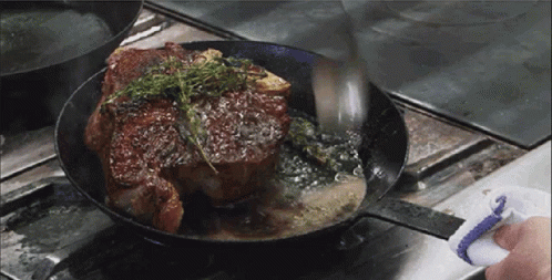 Sizzling Meat Perfection In Pan GIF