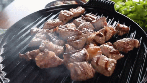 Juicy Cubed Meat Grilling To Perfection GIF