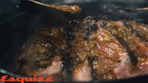 Meat Cooking in Pan With Esquire